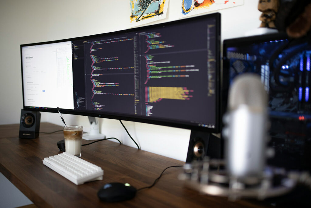 accelerate - ai development agency — business team collaborating with AI technology - Photo by ThisIsEngineering on Pexels
