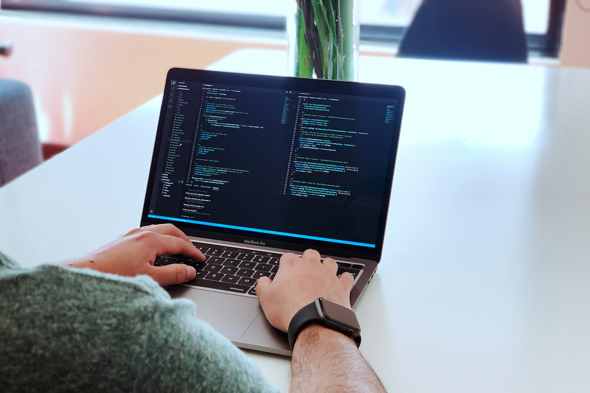 ai agent development company in bangalore — team collaborating on a whiteboard - Photo by Moe Magners on Pexels