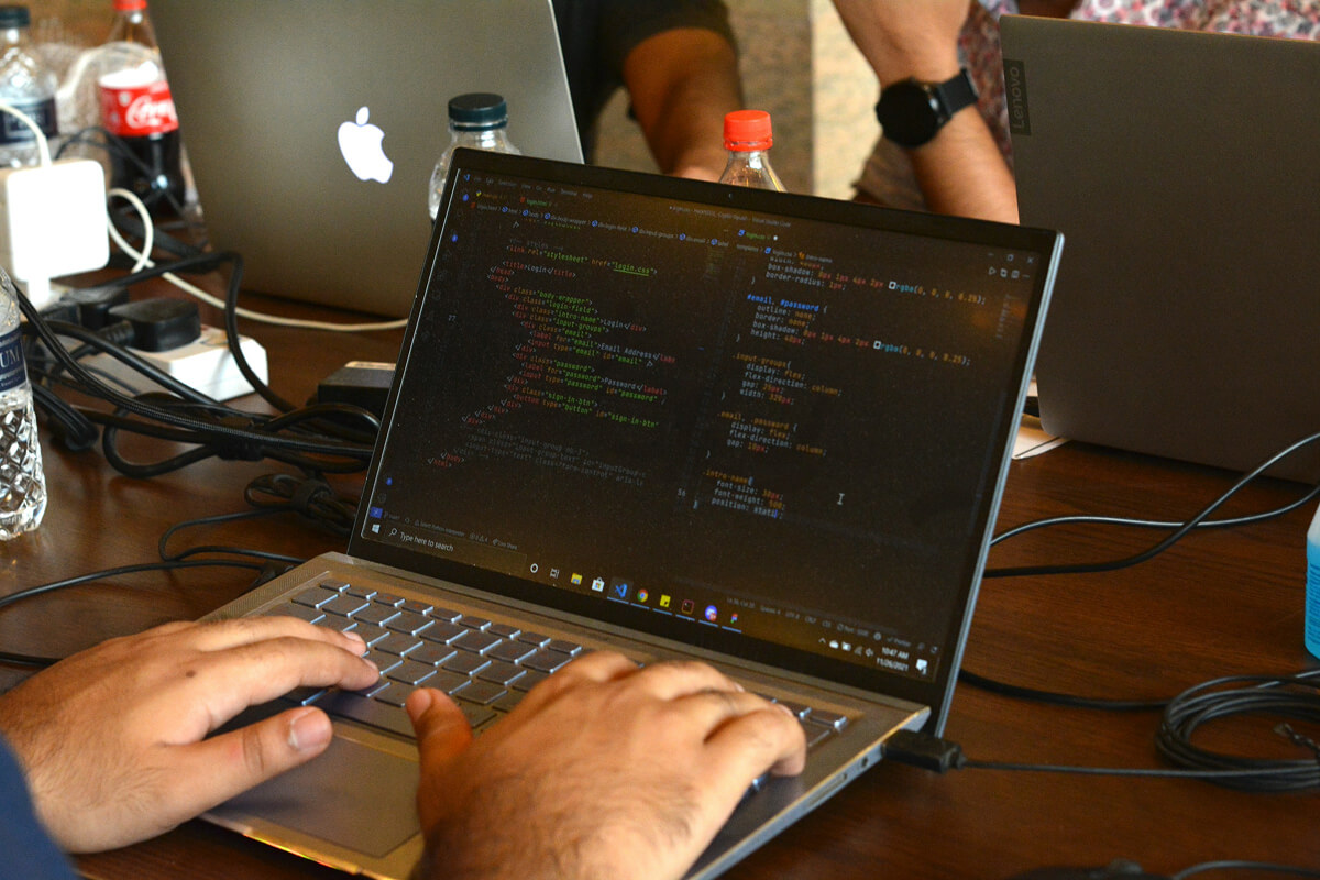 Developer building an AI SaaS platform on a laptop.