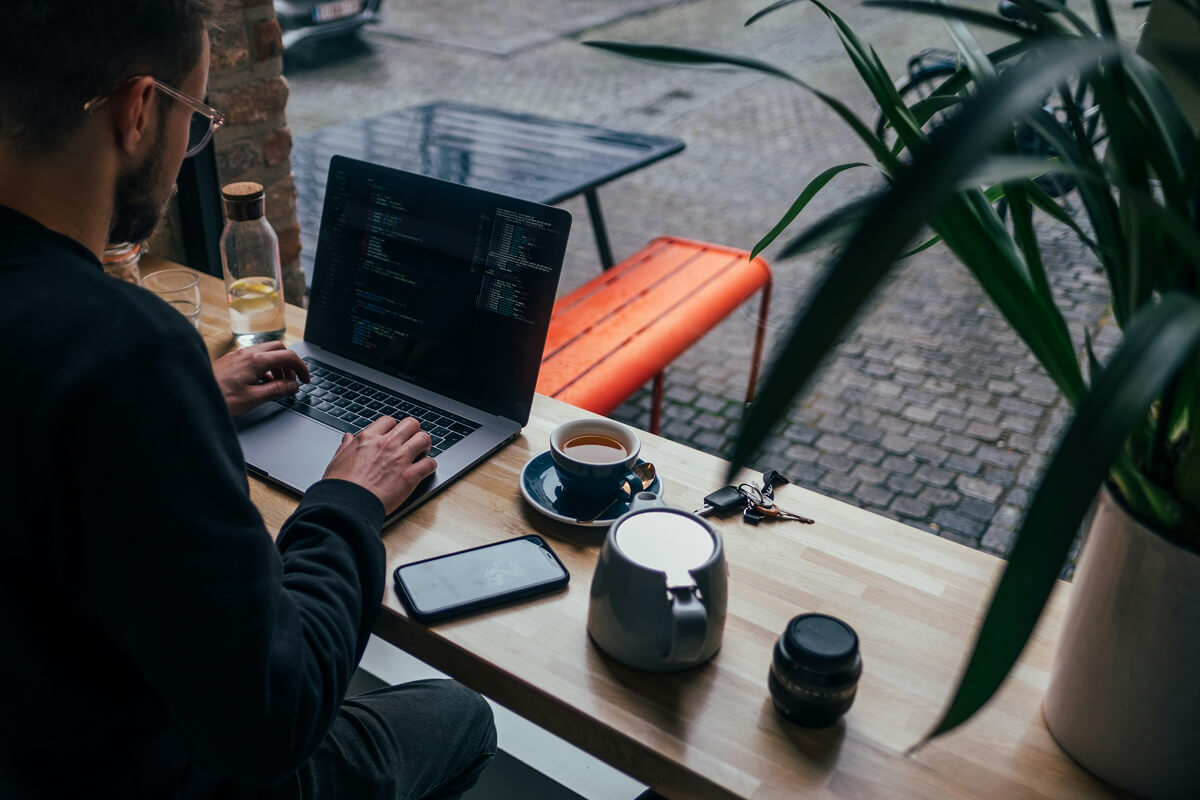 ai powered software development life cycle from requirements to maintenance — developer working on code at desk - Photo by Zayed Hossain on Pexels
