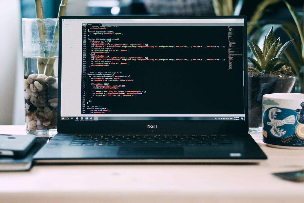 ai agent development with no code tool for non coders — developer working on code at desk - Photo by Zayed Hossain on Pexels