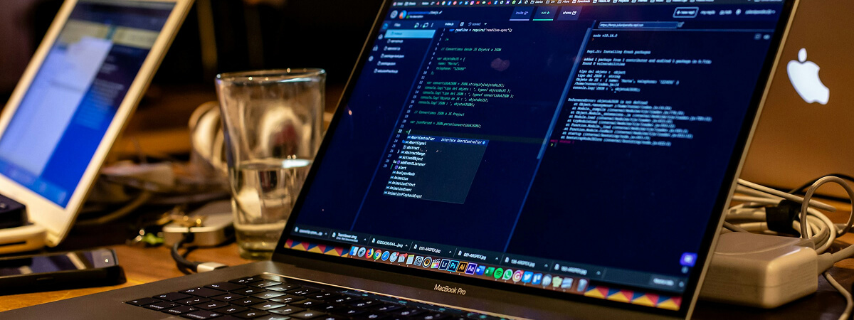how to start ai development — person using AI tools on a laptop - Photo by Matheus Bertelli on Pexels